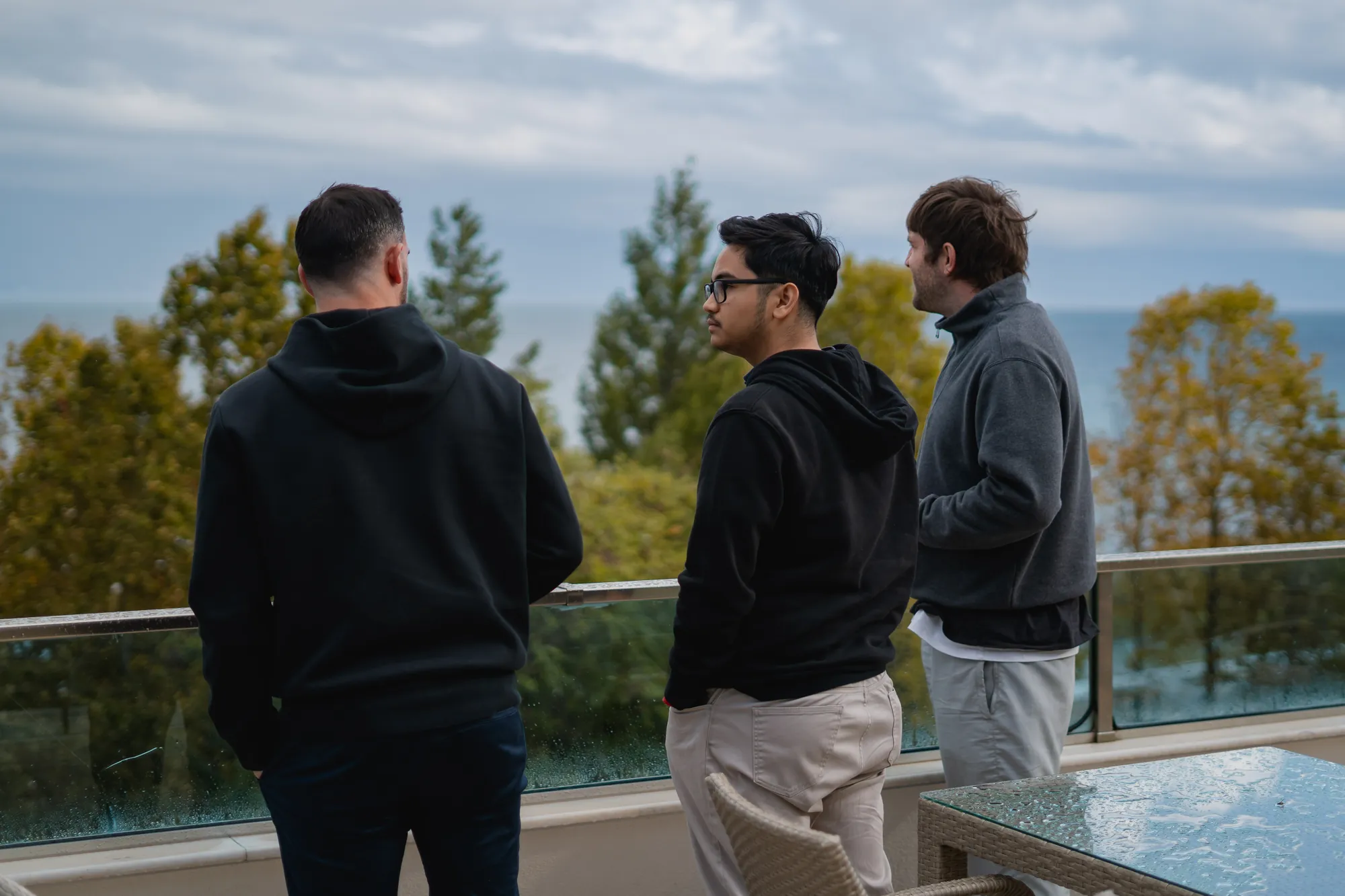 Overlooking the water with colleagues